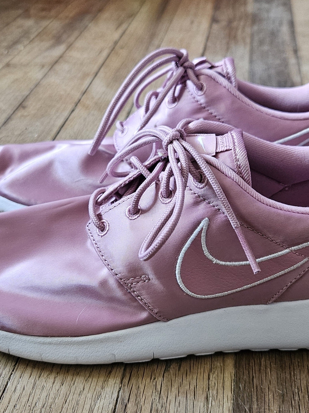 Nike Women’s Pink Lace-Up Sneakers with White Swoosh
